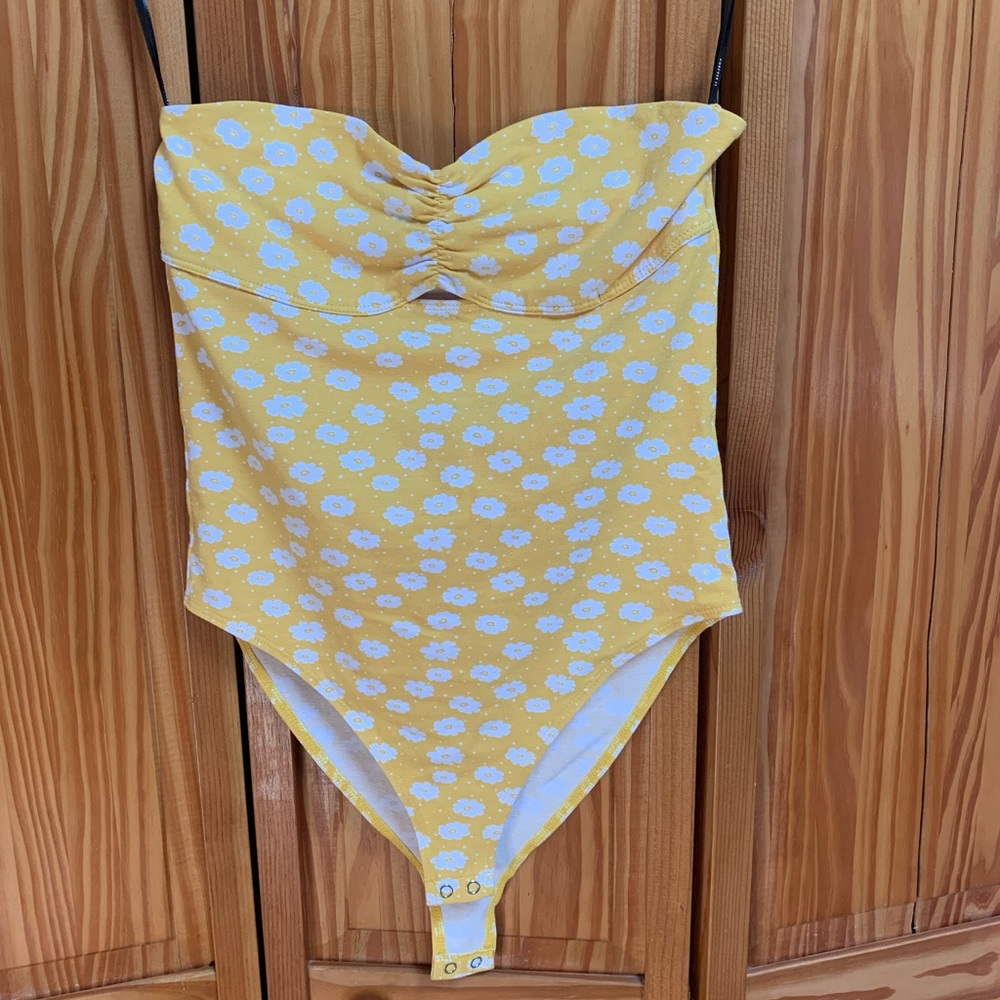 Yellow flower body suit